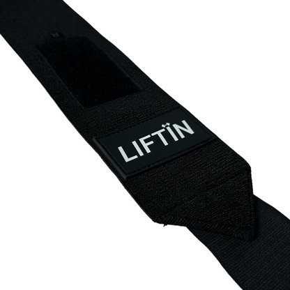 Close-up van het hoogwaardige materiaal van de LIFTIN wrist wraps - zwart, duurzaam en comfortabel